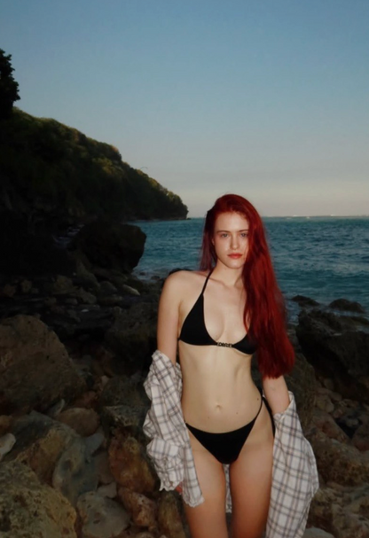 Marta L